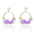 Elegant Gold Earrings with Flowers and Pearls