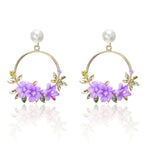 Elegant Gold Earrings with Flowers and Pearls