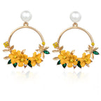Elegant Gold Earrings with Flowers and Pearls