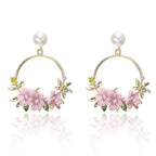 Elegant Gold Earrings with Flowers and Pearls